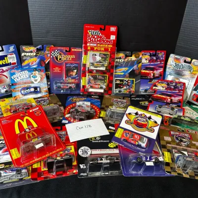 25 1:64 Scale Diecast NASCAR Replicas, Sealed.