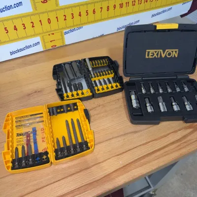 Sale Photo Thumbnail #202: Collection of driver bit sets including a Lexivon bit socket set in hard case and DeWalt ToughCase storage containers with various driver bits.