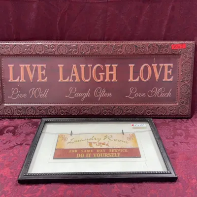 Sale Photo Thumbnail #8: Two framed wall decor pieces, including a large embossed metallic 'Live Laugh Love' sign and a smaller framed 'Laundry Room' print.