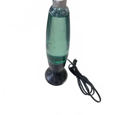 Sale Photo Thumbnail #277: Novelty motion lamp featuring a clear glass vessel filled with teal liquid on a black pedestal base.