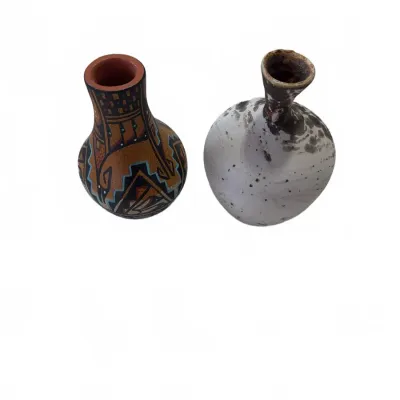 Sale Photo Thumbnail #276: Pair of small ceramic bud vases, including a Southwestern-style painted pottery vessel and a speckled studio art pottery piece.
