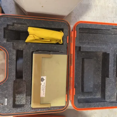 Sale Photo Thumbnail #45: Vintage Amoco Production Co. field equipment stored in a heavy-duty orange padded hard case with custom foam cutouts.
