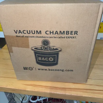 Sale Photo Thumbnail #206: BACO Engineering vacuum chamber unit packaged in its original cardboard box, measuring approximately 14 inches high.