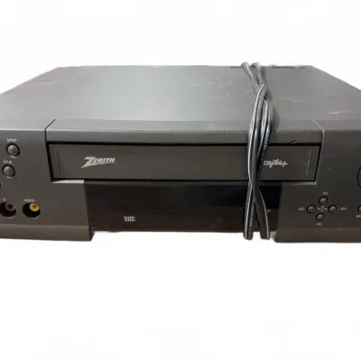 Sale Photo Thumbnail #118: Vintage Zenith black VCR player with front AV inputs, showing light surface wear.