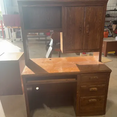 Sale Photo Thumbnail #63: Traditional oak student computer desk with upper hutch, keyboard tray, and three side drawers.