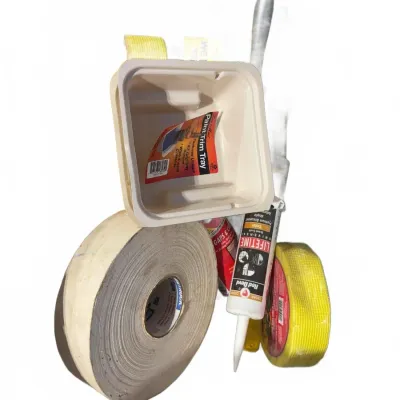 Sale Photo Thumbnail #108: Assorted home improvement and painting supplies, including drywall joint tape, fiberglass mesh tape, caulk tubes, and a paint trim tray.