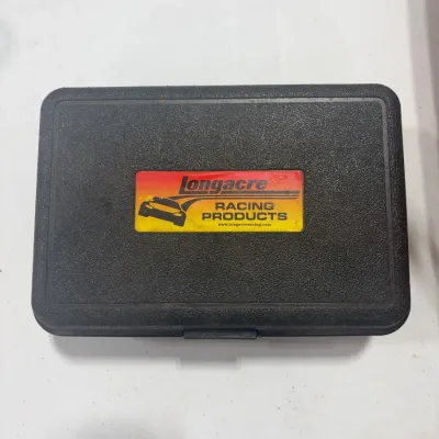 Sale Photo Thumbnail #88: Black textured hard plastic carrying case featuring a Longacre Racing Products decal.