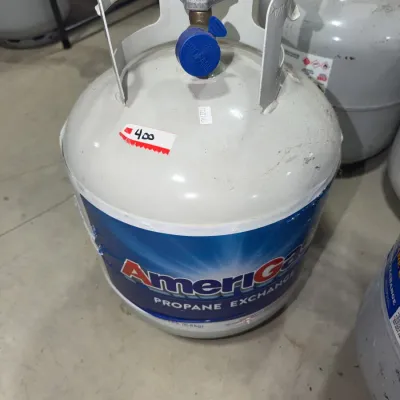Sale Photo Thumbnail #176: AmeriGas 20 lb propane tank, showing light surface wear and marked with a price sticker.