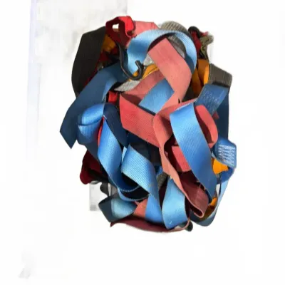 Sale Photo Thumbnail #109: Assorted pile of colorful tie-down straps and bungee cords in red, blue, yellow, and black.