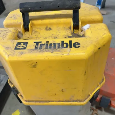 Sale Photo Thumbnail #46: Trimble survey instrument hard carrying case in heavy-duty yellow and gray molded plastic.