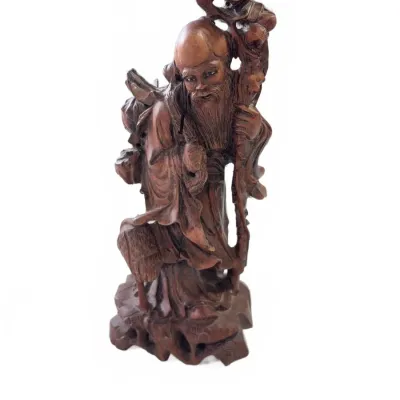 Sale Photo Thumbnail #300: Hand-carved wooden Chinese wise man figurine holding a staff and peach, featuring intricate details and a dark stained finish.