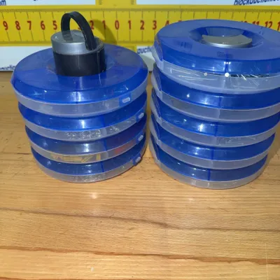 Sale Photo Thumbnail #198: Two stacked blue and clear plastic round organizer towers filled with various small hardware items, fastners, and craft supplies.