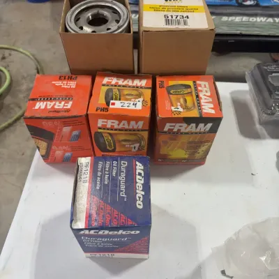 Sale Photo Thumbnail #85: Assortment of boxed automotive oil filters including Fram Extra Guard PH13 and PH5, Wix 51734, and ACDelco Duraguard PF1218.