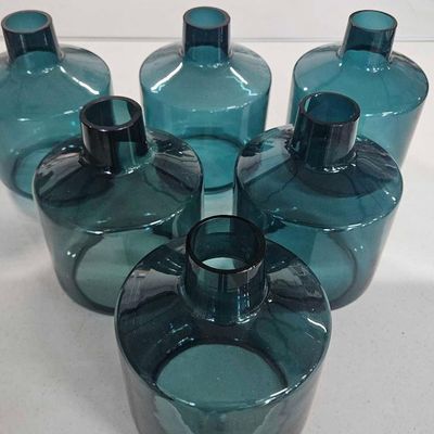 Sale Photo Thumbnail #377: A Set of Teal Glass Vases