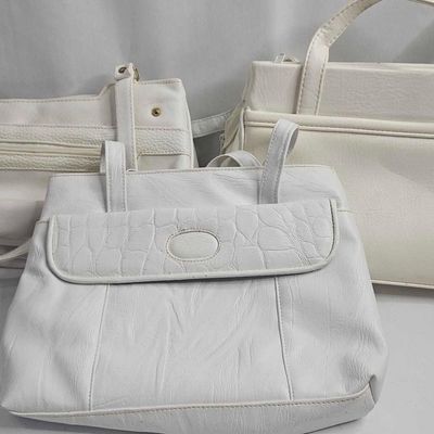 Sale Photo Thumbnail #92: Three White Leather Handbags