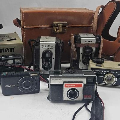 Sale Photo Thumbnail #462: Canon, Argus & Kodak Cameras & Acc