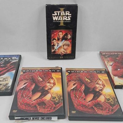 Sale Photo Thumbnail #421: Set 5 Star Wars & Marvel VHS & DVDs