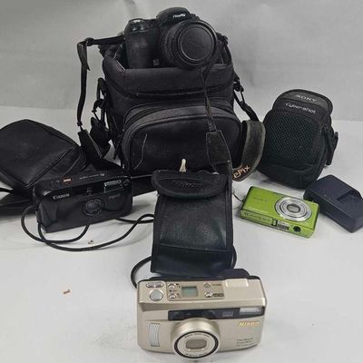 Sale Photo Thumbnail #468: Nikon, Fuji, Sony & Canon Camera Lot