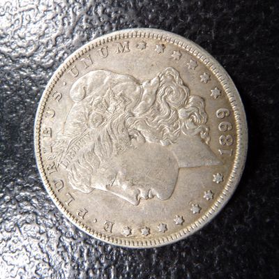 1899-O MORGAN SILVER DOLLAR
