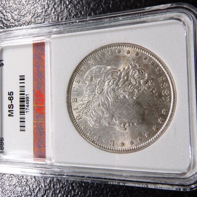 1886 AGP MS65 MORGAN SILVER DOLLAR