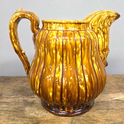 Sale Photo Thumbnail #136: Bennington Flint Enamel Rib-Pattern Pitcher (1845)