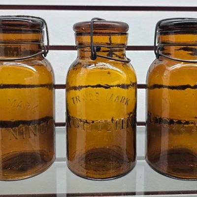 Sale Photo Thumbnail #132: Tradmark Lightening Amber Qaurt Fruit Jars 3