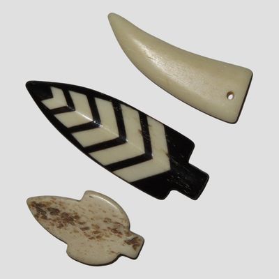 Sale Photo Thumbnail #701: Lot of 3 Vintage Bone Effigy Pendants: Arrowhead, Claw / Tooth, and Leaf, Tourist Trade, Dakotas