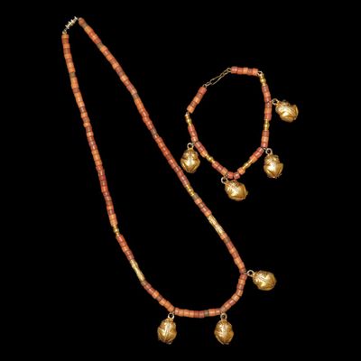Sale Photo Thumbnail #563: Pre-Columbian Taino-Style Beaded Necklace & Bracelet with Numerous Gold-Plated Frog Charms & Effigy Beads