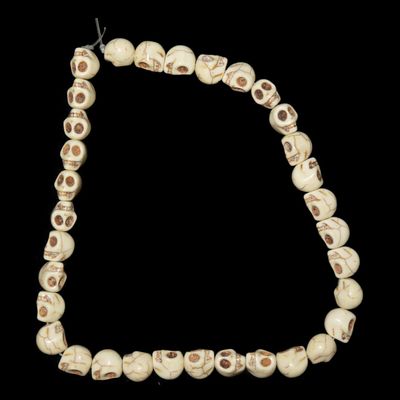 Sale Photo Thumbnail #634: Vintage Strand of Skull Beads