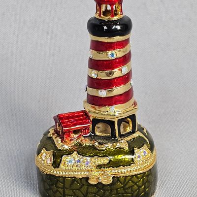 Sale Photo Thumbnail #91: Enameled Gilt Lighthouse Trinket Box