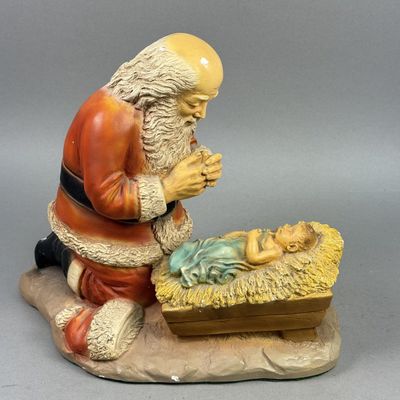 Sale Photo Thumbnail #319: R. P. Gauer Kneeling Santa Ceramic Figurine