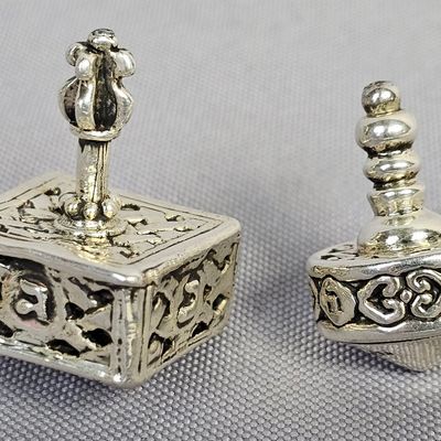 Sale Photo Thumbnail #16: Pair of Sterling Hanukkah Dreidels