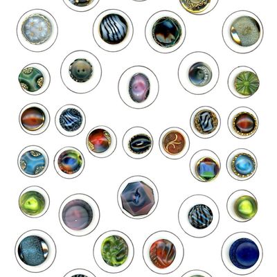 A CARD OF DIVISION THREE COLORFUL BLACK GLASS BUTTONS