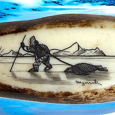 A DIVISION THREE PICTORIAL SCRIMSHAWED BUTTON