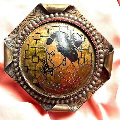 A DIVISION THREE HANDKERCHIEF CORNER BUTTON