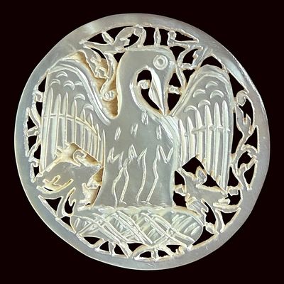 Sale Photo Thumbnail #328: A DIVISION THREE CARVED PEARL PICTORIAL BUTTON