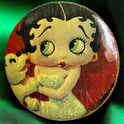 A DIVISION THREE STUDIO ARTIST BUTTON