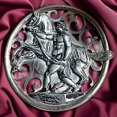 Sale Photo Thumbnail #240: A DIVISION ONE PIERCED HORSE AND RIDER BUTTON