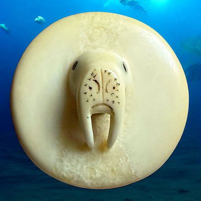 A DIVISION ONE HIGH RELIEF WALRUS BUTTON