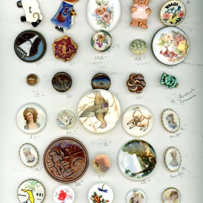 A CARD OF DIVISION ONE AND THREE CERAMIC BUTTONS
