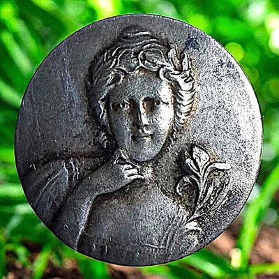 A DIVISION ONE THIRD AVENUE SILVER BUTTON