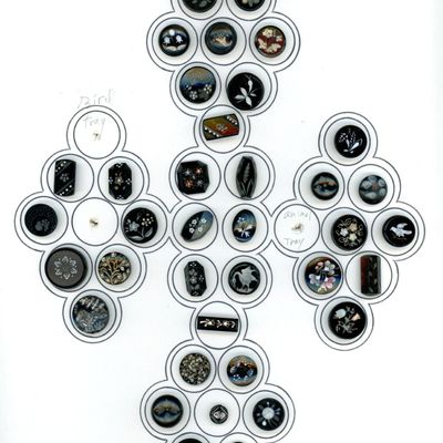 A CARD OF DIVISION ONE BLACK GLASS BUTTONS