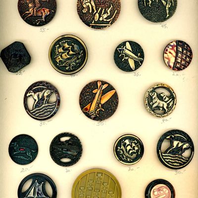 A CARD OF DIVISION THREE CELLULOID PICTORIAL BUTTONS
