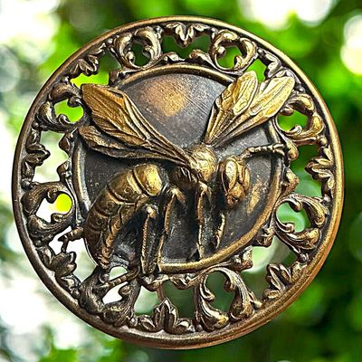 Sale Photo Thumbnail #350: A COOL DIVISION ONE PIERCED BRASS ANIMAL BUTTON