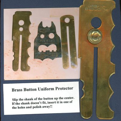 Sale Photo Thumbnail #175: A BRASS BUTTON AND A BRASS BUTTON MECHANISM