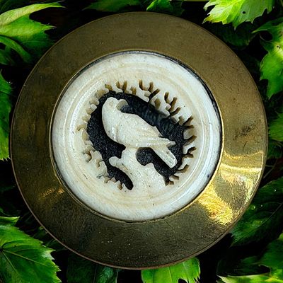 Sale Photo Thumbnail #177: A DIVISION ONE CARVED ANIMAL SET IN METAL BUTTON
