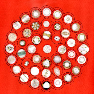 A CARD OF DIVISION THREE MOONGLOW GLASS BUTTONS