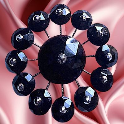 Sale Photo Thumbnail #233: A DIVISION ONE PIERCED RIVETED BLACK GLASS BUTTON