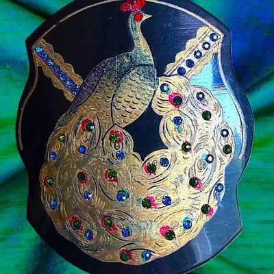 A DIVISION ONE JEWELED AND PAINTED PEACOCK