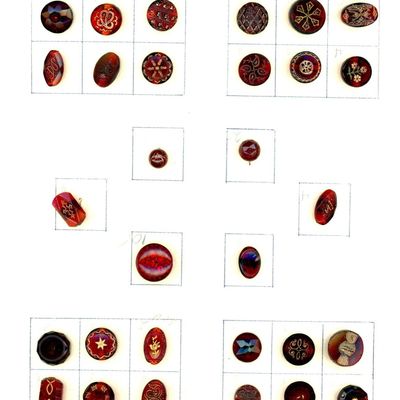 A CARD OF DIVISION ONE CHARMSTRING GLASS BUTTONS